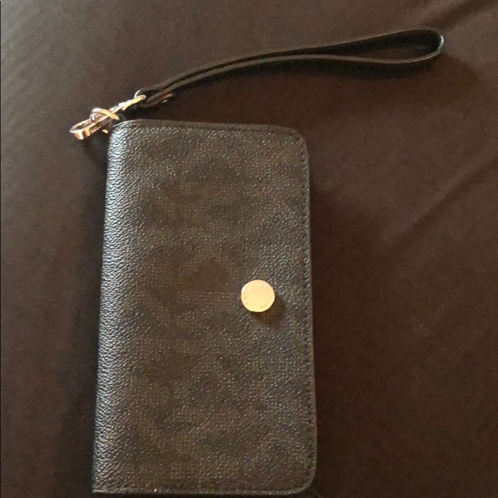 Micheal Kors iPhone wallet. Brand new